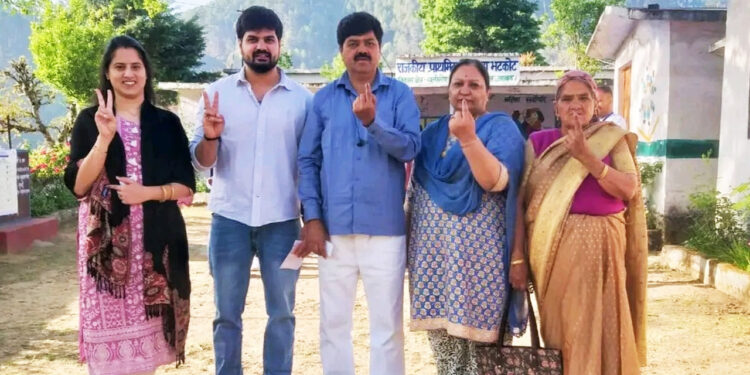 Ganesh Godiyal voted with his family